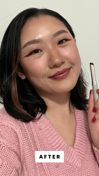 Han after applying the Almost Lipstick in Black Honey